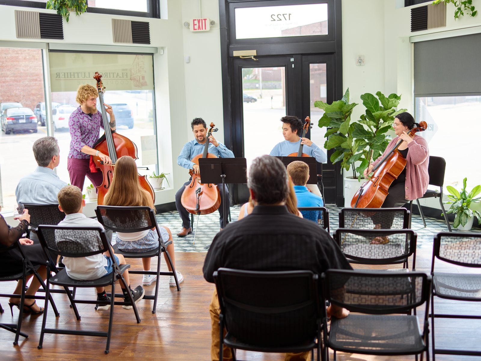 A live performance with a seated audience